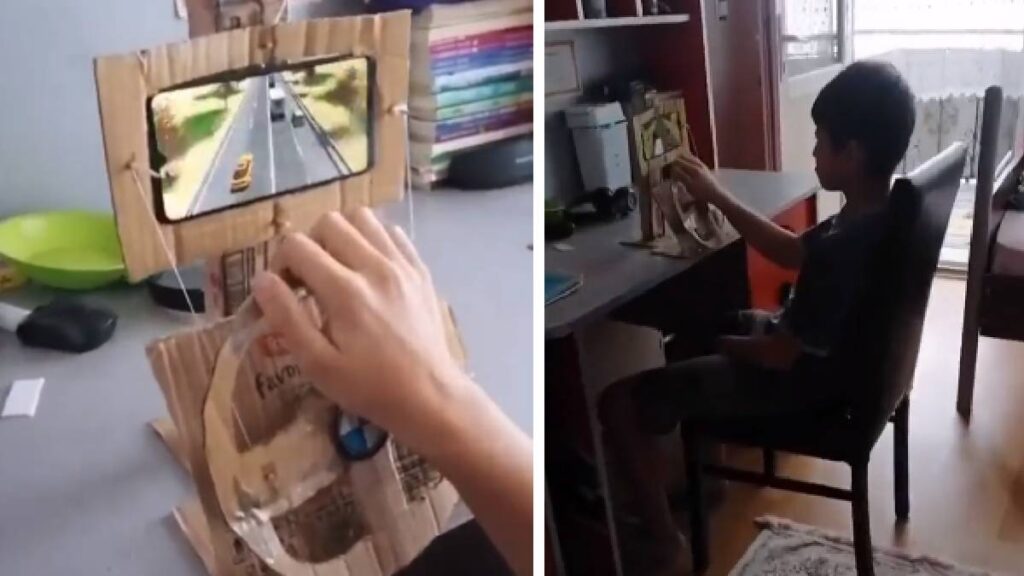 Coloca el volante en la base, encajando el pequeño tubito dentro del agujero que hicimos previamente. Después, solo resta encajar el celular en el sitio correspondiente, colocar tu juego de carreras favorito ¡Y a disfrutar!